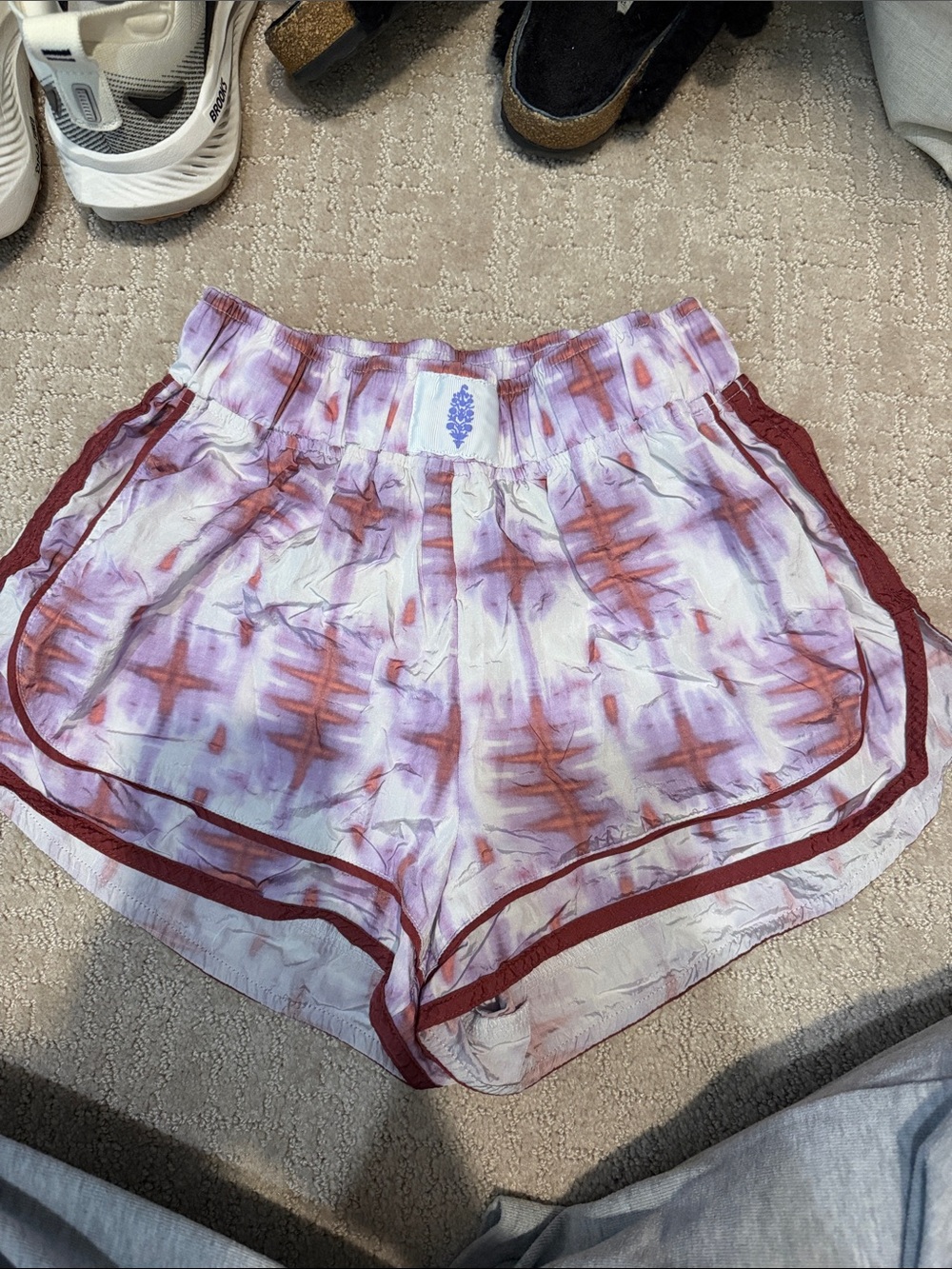 Free people movement shorts- purple tie die like pattern
